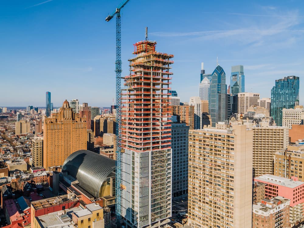 Aerial footage of building in construction in Philadelphia